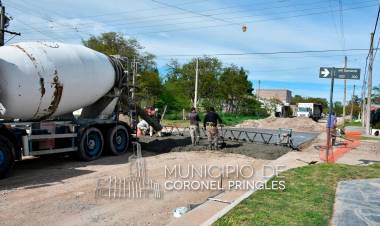 Una cuadra más de pavimento en la ciudad